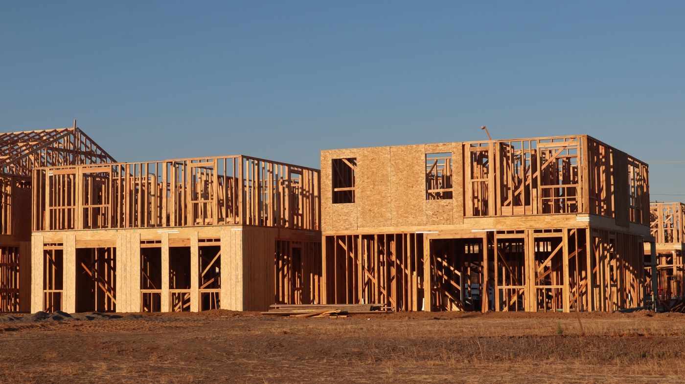 Wooden frames of new homes under construction in a Sydney residential development