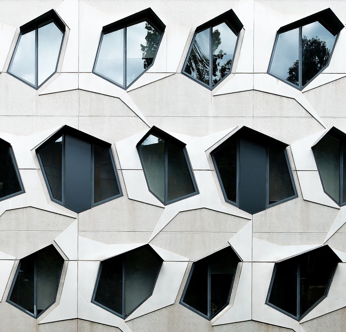 Modern geometric luxury home facade with architectural windows in NSW