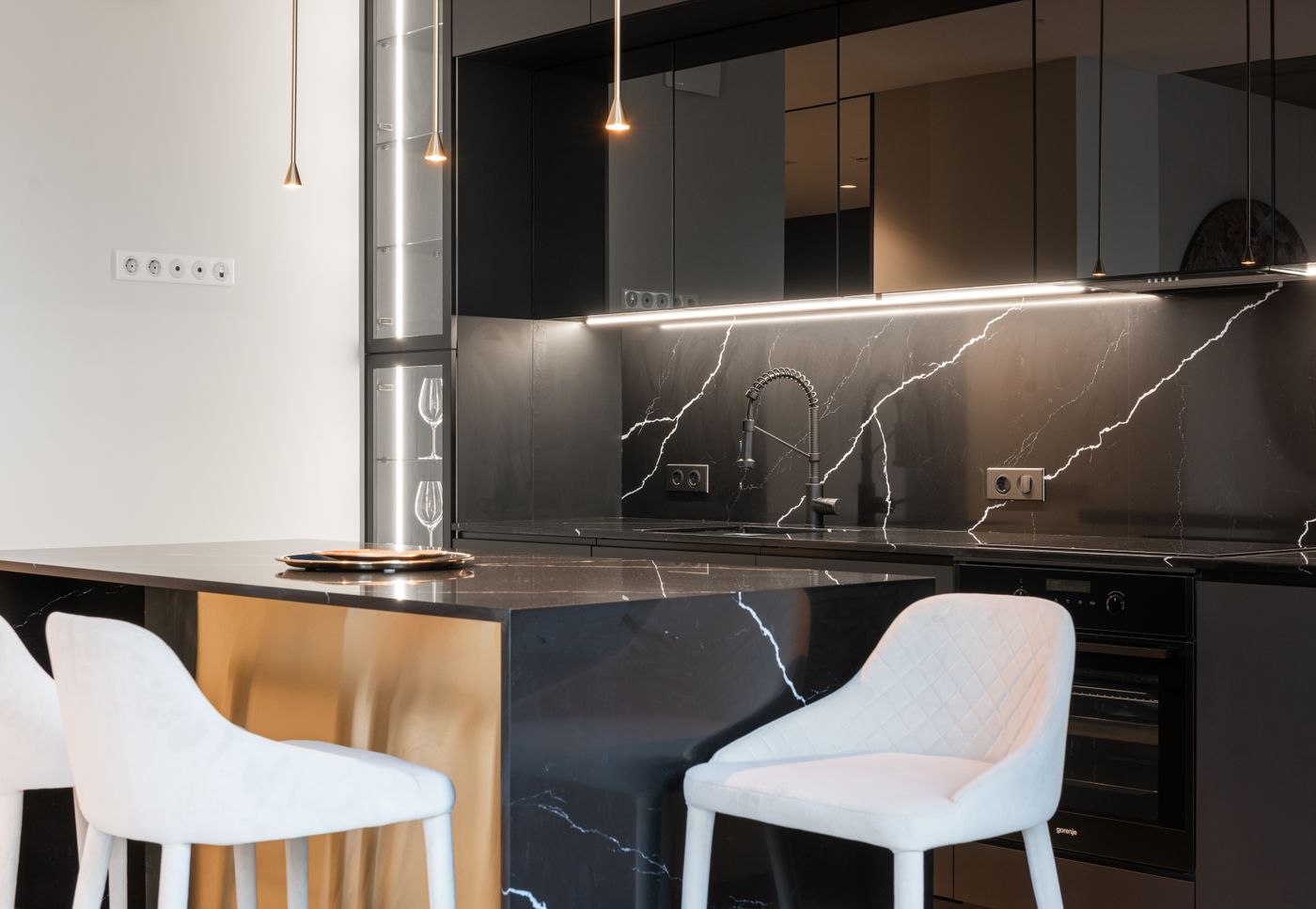Modern open-plan kitchen and living interior with natural light typical of a townhouse design